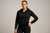 Generate a Image of Female Model Wearing Black Tracksuit